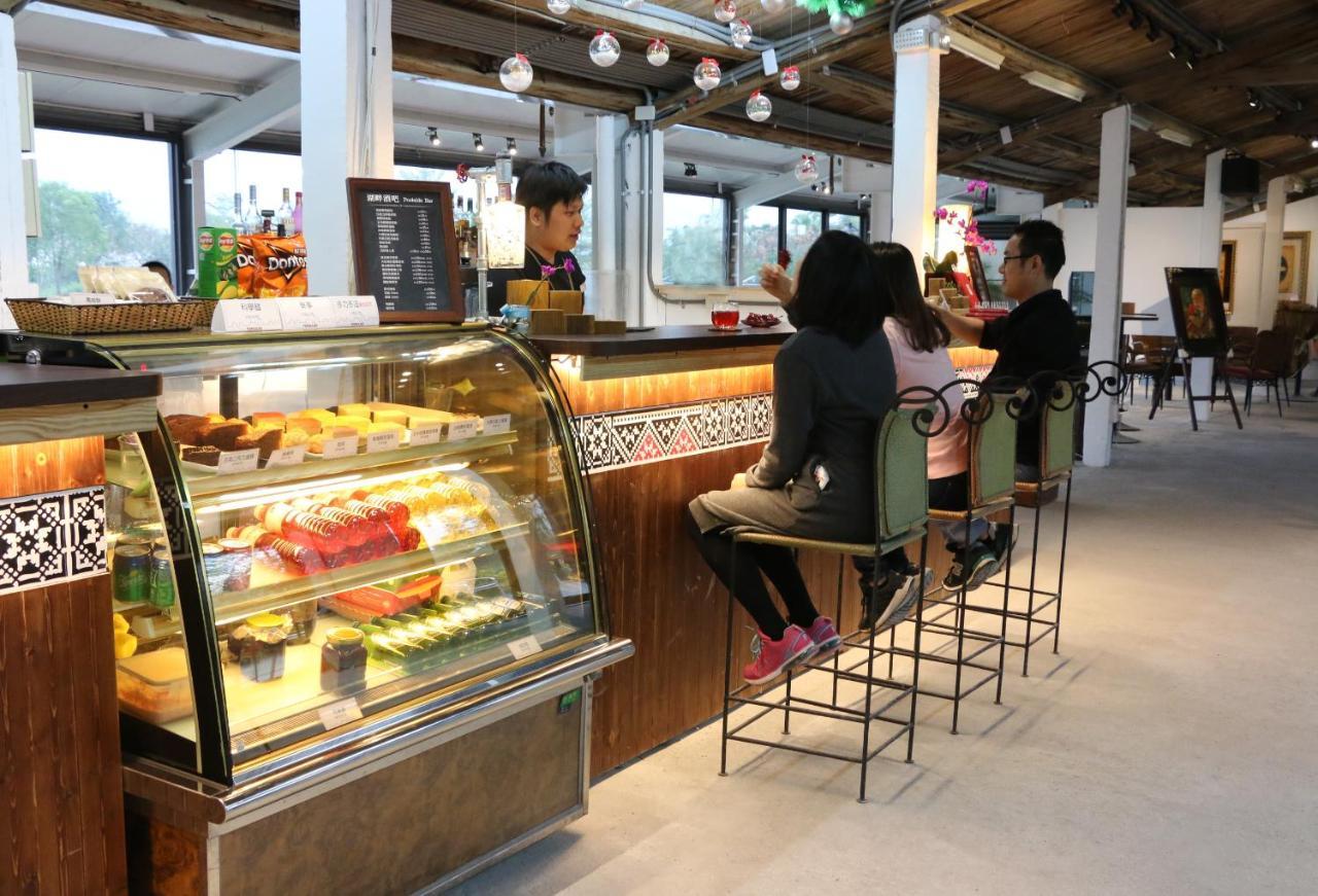 プロミスドランド リゾート&ラグーン 寿豊郷 エクステリア 写真 A café in the lobby of the hotel